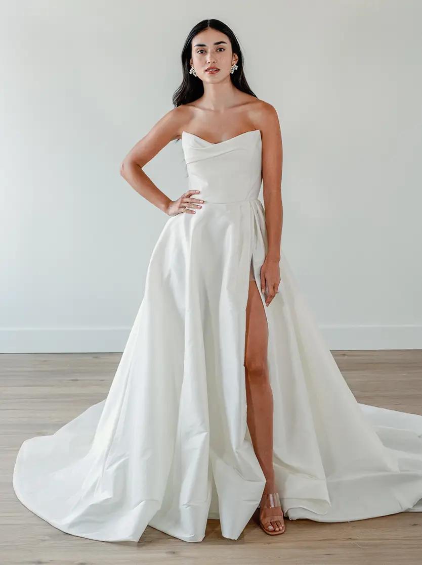 Model wearing a white gown